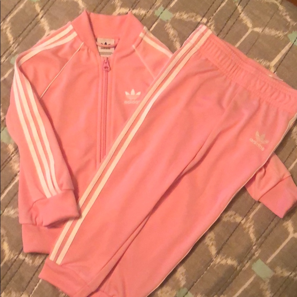 Pink adidas track suit